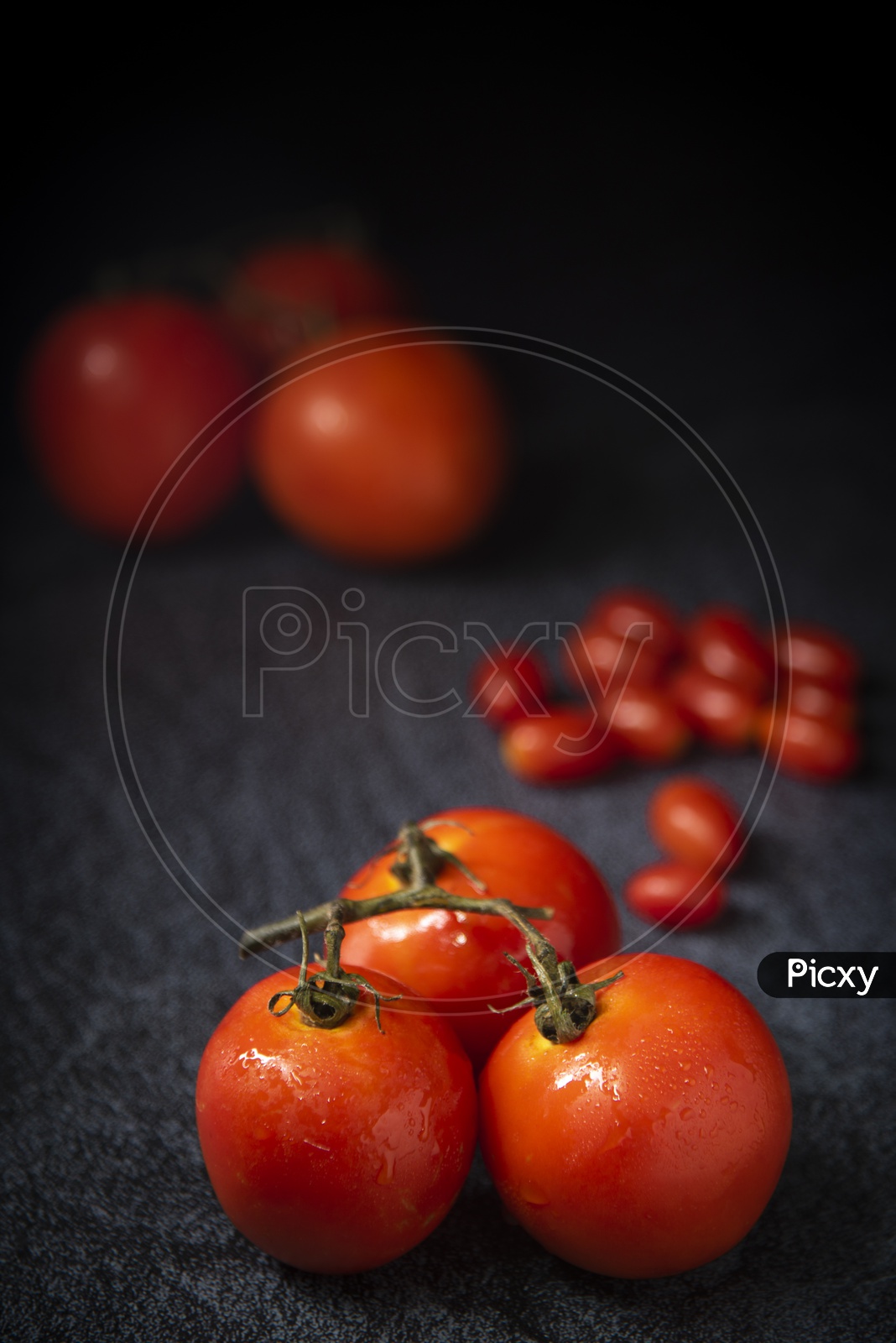 Closeup Shot of Fresh Red Tomatoes on Wooden Background