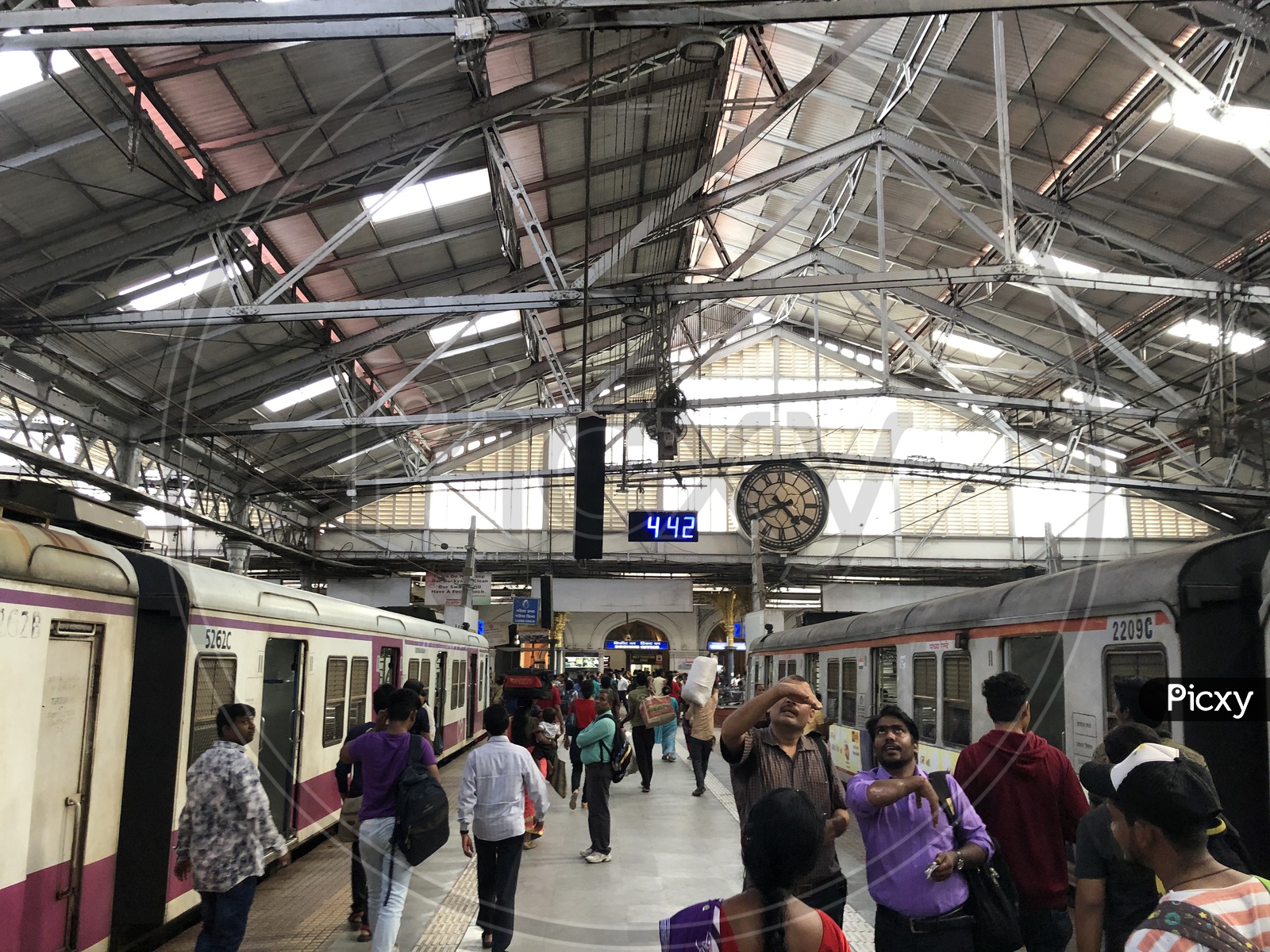 Commuters on Platforms Of  Mumbai Suburban Train Station
