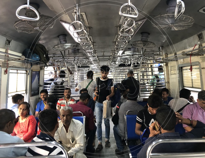 Commuters Travelling in Mumbai Suburban Train
