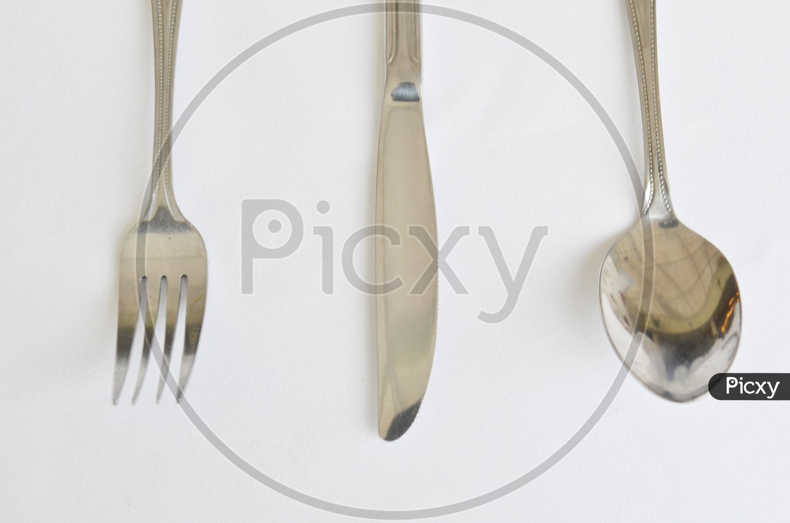 Fork spoon and knife on  table
