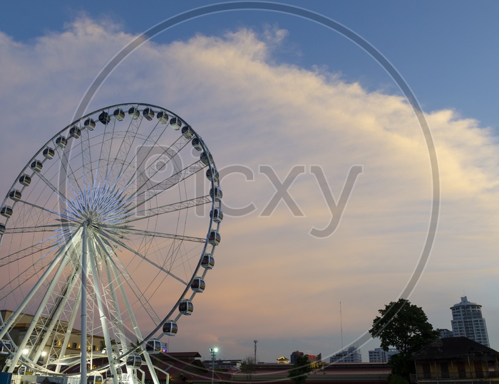Beautiful large Ferris wheel With Blue Hour Sky Background