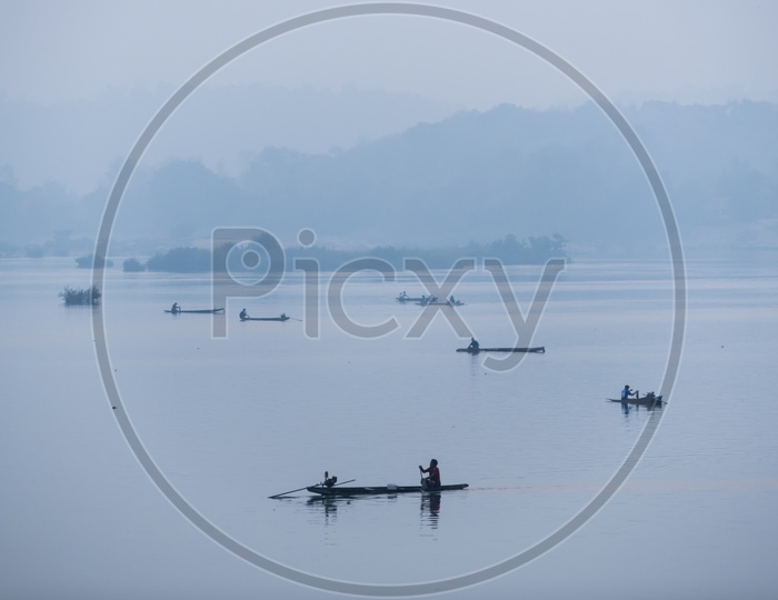 Fisherman Fishing In Small Boats At Songkhla in Thailand