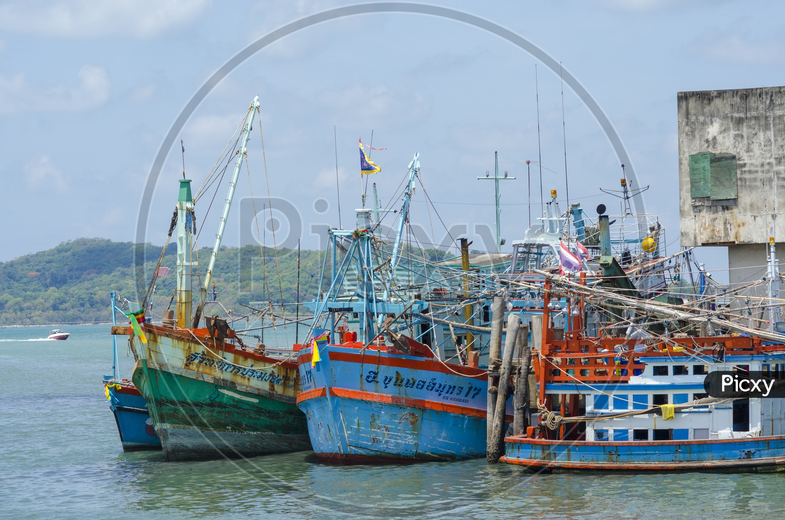 Local Fishing Boats in Sea Waters At Phuket beach