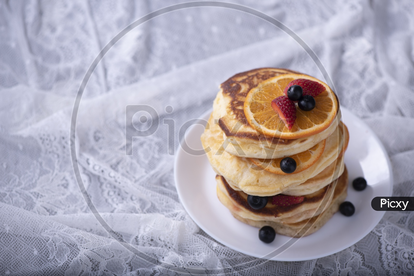 Pancake stack with Strawberry and Blueberry