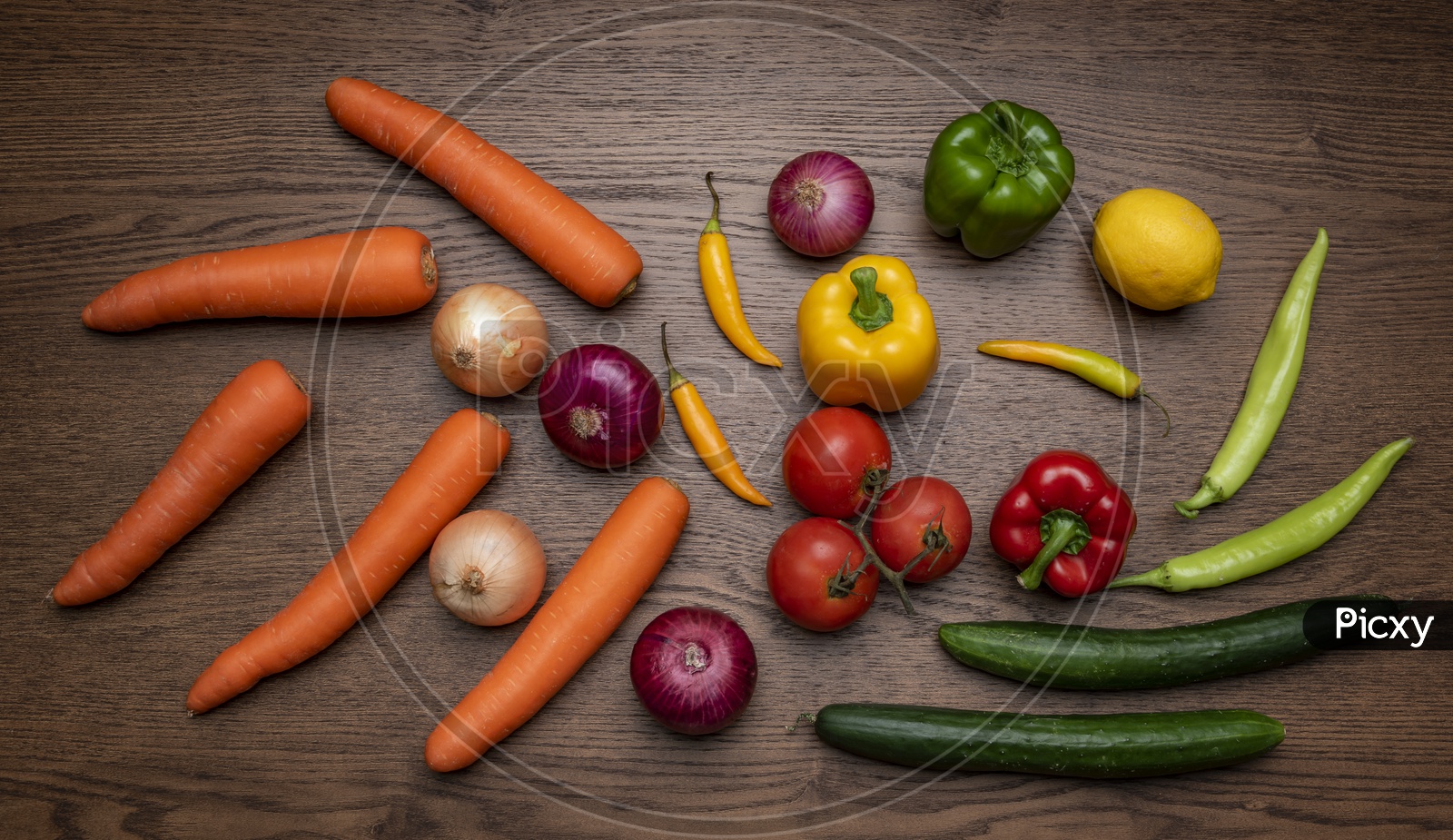 Top View of Fresh Vegetables on Wooden Background, Capsicum, Onions, Tomatoes