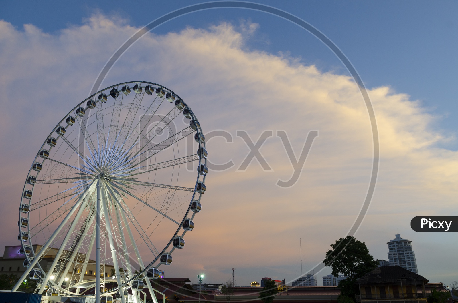 Beautiful large Ferris wheel With Blue Hour Sky Background