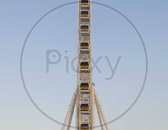 Beautiful large Ferris wheel With Blue Sky Background