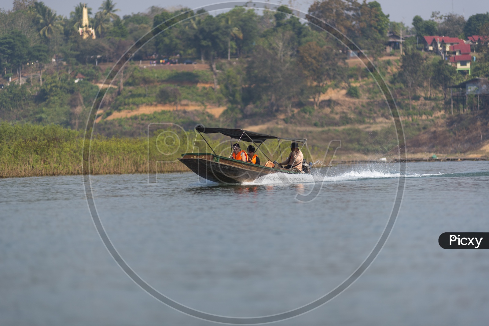 Tourists Enjoying Motor Boat Rides on  Meklong river, Thailand.