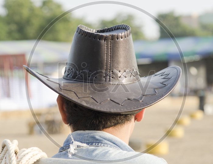 Horseman Or Equestrian   Wearing a Cow boy Hat