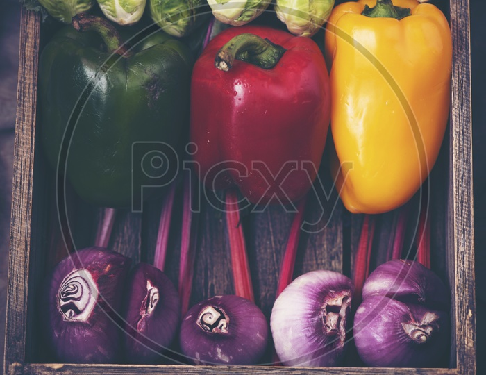 Vegetables in a Wooden Box, Capsicum, Onions