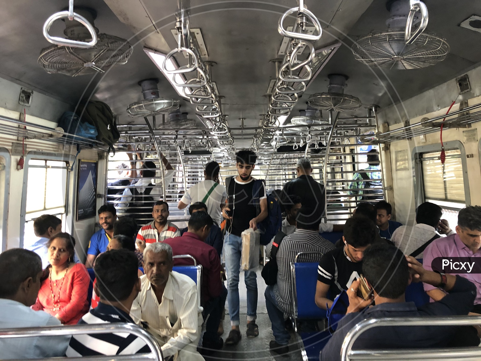 Commuters Travelling in Mumbai Suburban Train