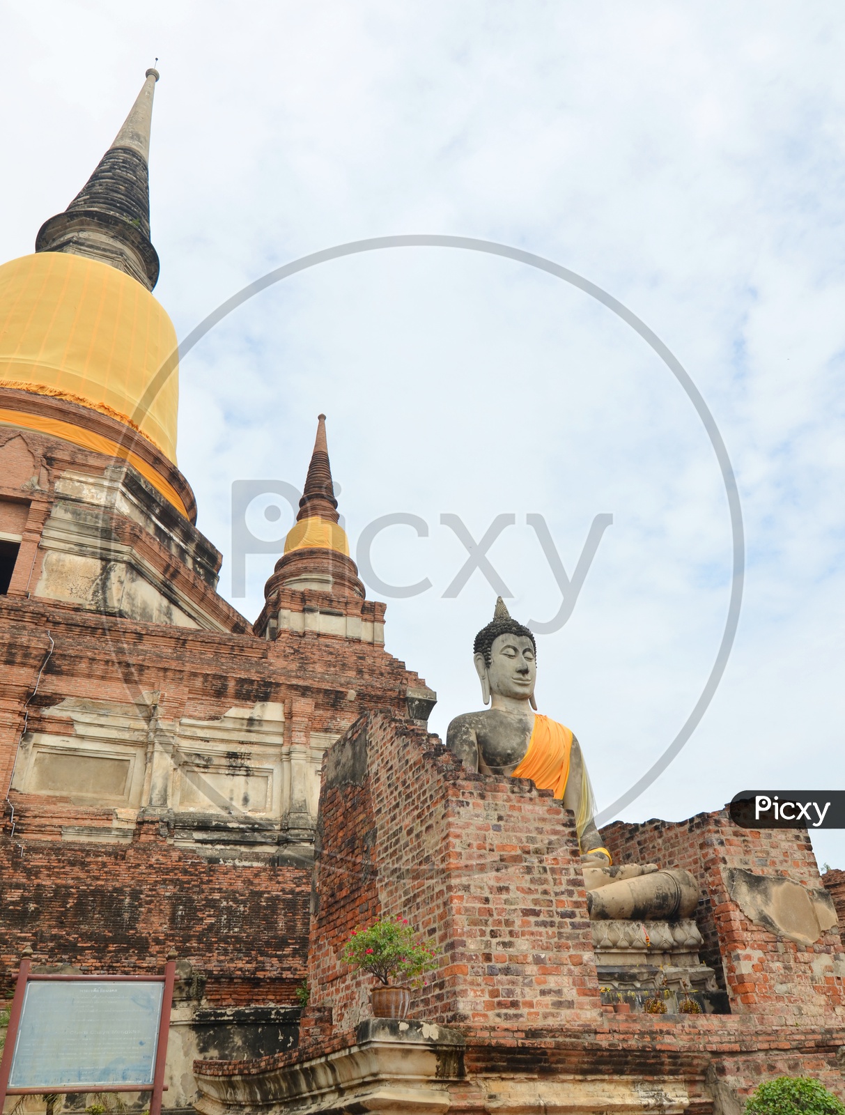 Ancient Buddhist Temple With Buddha Statues At Wat Yai Chai Mongkol in  Ayuttaya of Thailand