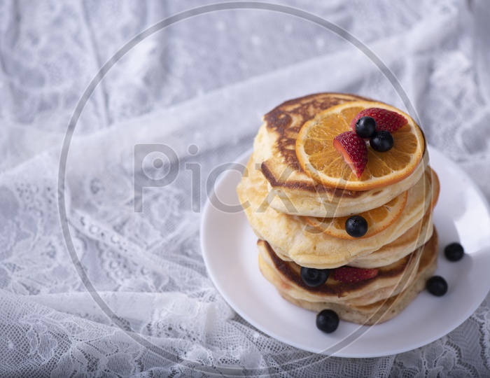 Pancake stack with Strawberry and Blueberry