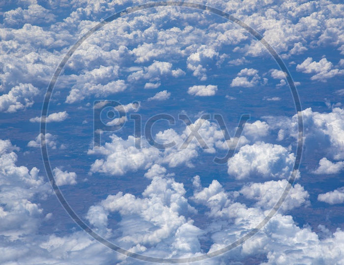 blue sky with cloud View from the passenger window in a Flight  in a Flight