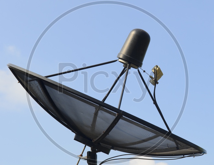 Satellite dish  Antenna  Over Blue Sky