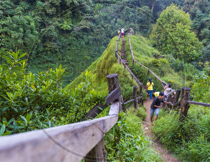 Tourists Trek to the Champasak waterfalls in Laos