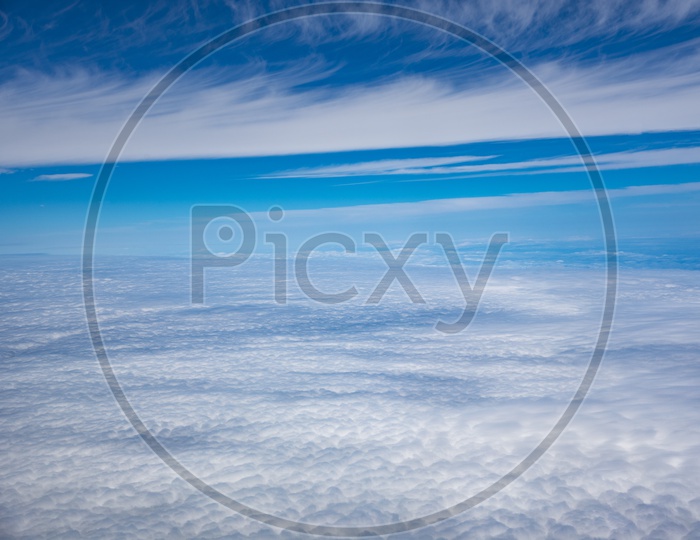blue sky with cloud View from the passenger window in a Flight