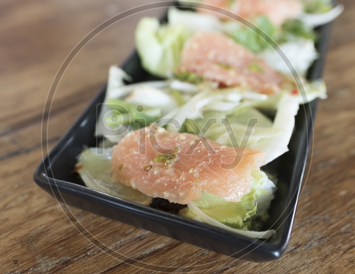 Japanese Cuisine Salmon Sashimi in a Plate