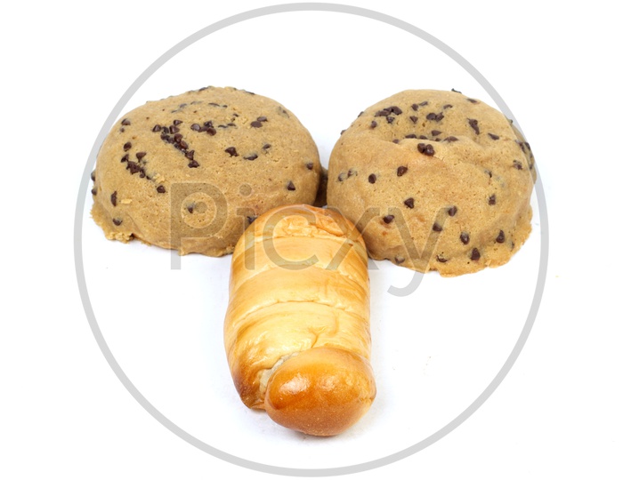 male penis and testicles concept With Cookies And Bread Loaf