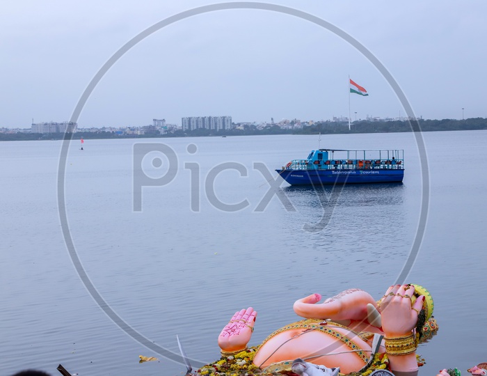 national flag ,  inspection boat ,  tank bund ,  lord ganesh