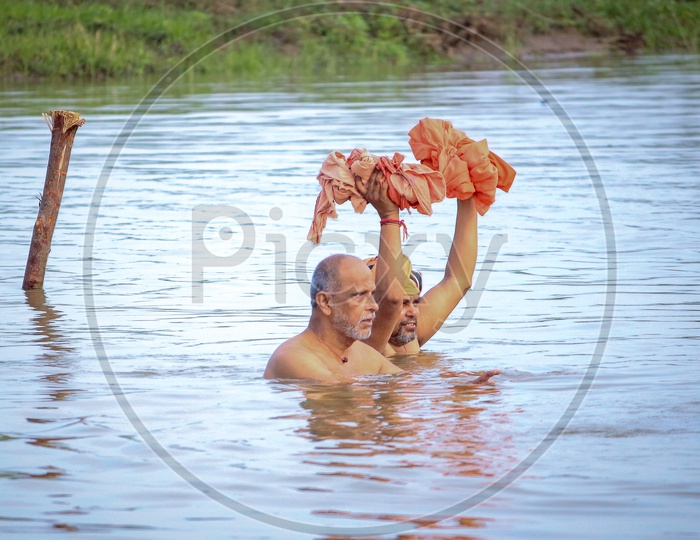Villagers Crossing Godavari River Channel Drowned to Neck