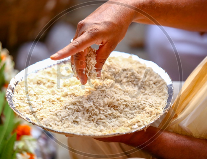 Priest Putting Rice Flakes in Homam Or Homa During Hindu Ceremonies