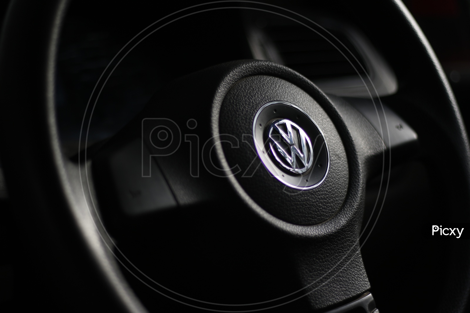 Volkswagen car steering wheel Logo