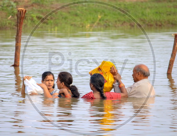 Villagers Crossing Godavari  River Channel  drowned To Neck