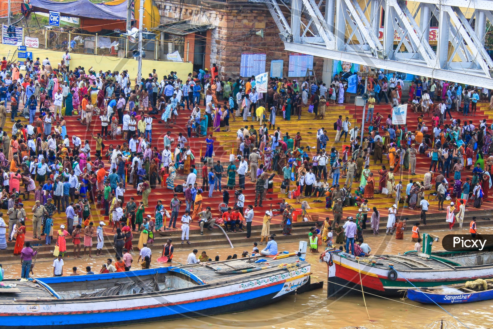 Crowded Ghats With devotees Taking Holy Bath In River Godavari During  Pushkaralu  At Rajahmundry
