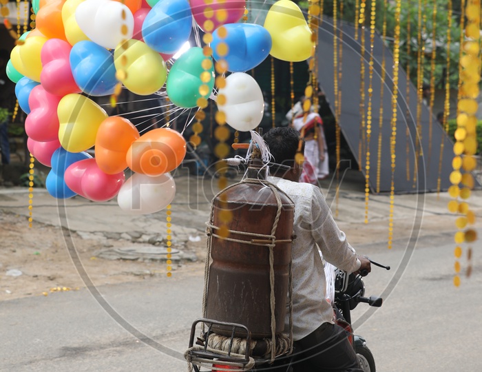 Indian Street Gas Balloons vendor on a vehicle