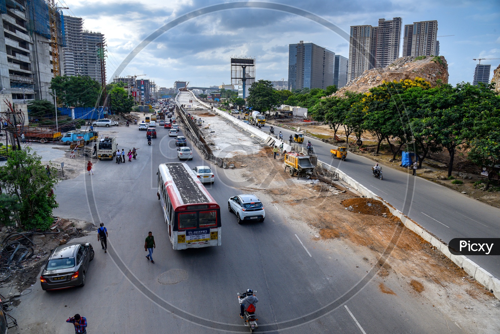 Commuting Vehicles on Road At Newly Constructing Flyover at Raidurgam in Hyderabad City
