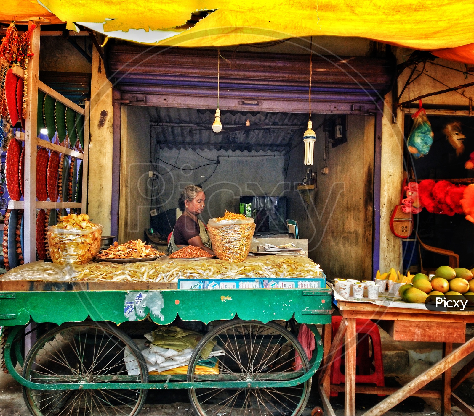Woman selling snacks and chips