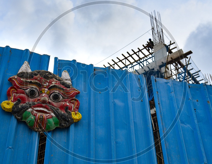 Scarecrow Face Masks At Newly Constructing Corporate Buildings