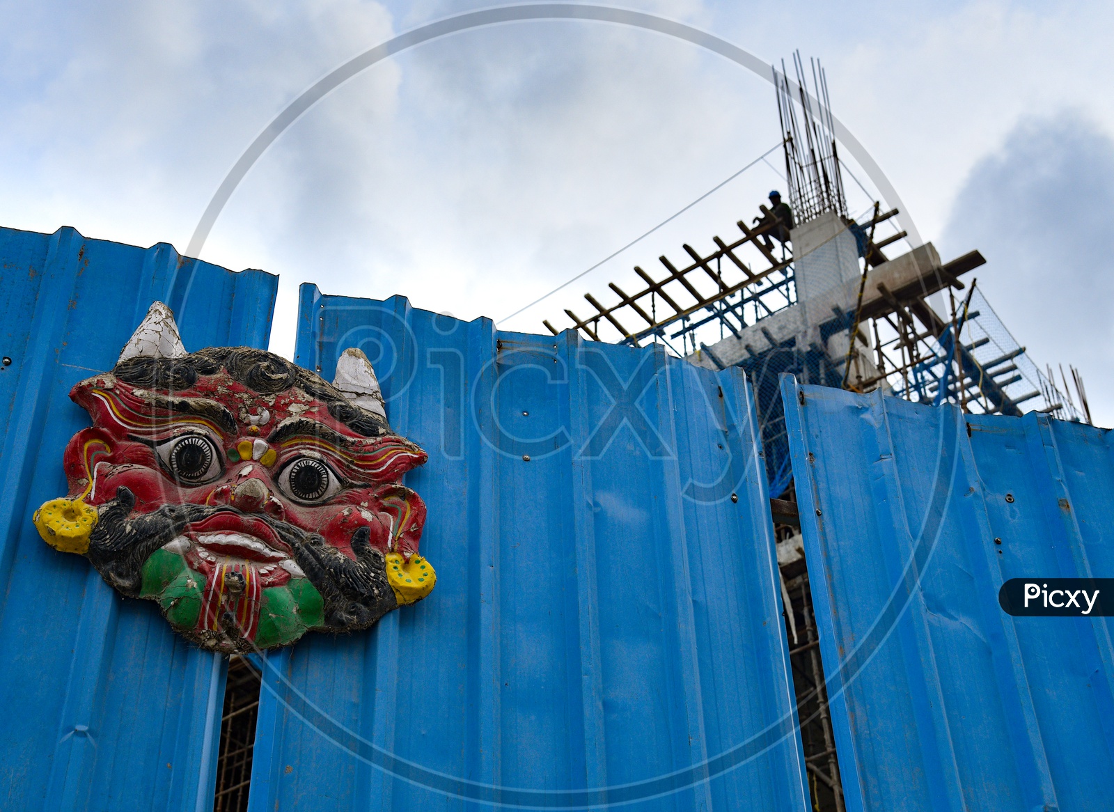 Scarecrow Face Masks At Newly Constructing Corporate Buildings