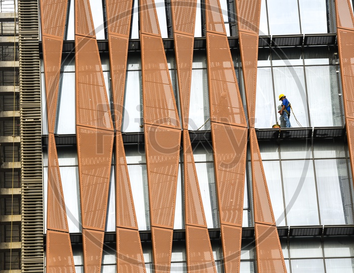 Facade Glass  Cleaning At The Sky View Corporate Building