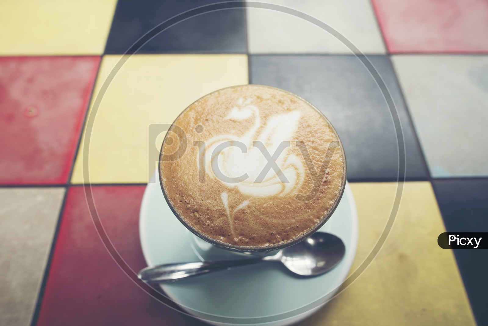 Latte Art On Coffee on Cafe Table