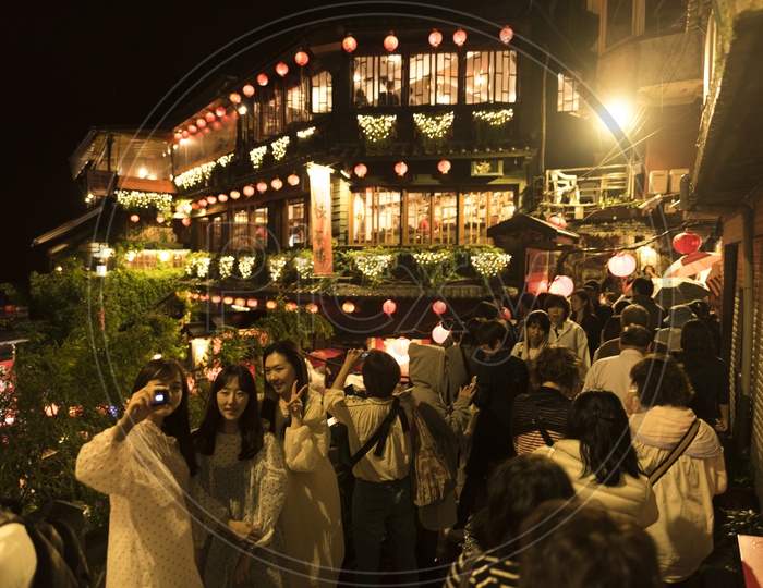 Busy Streets Of Jiufen With Tourists in Night Street market