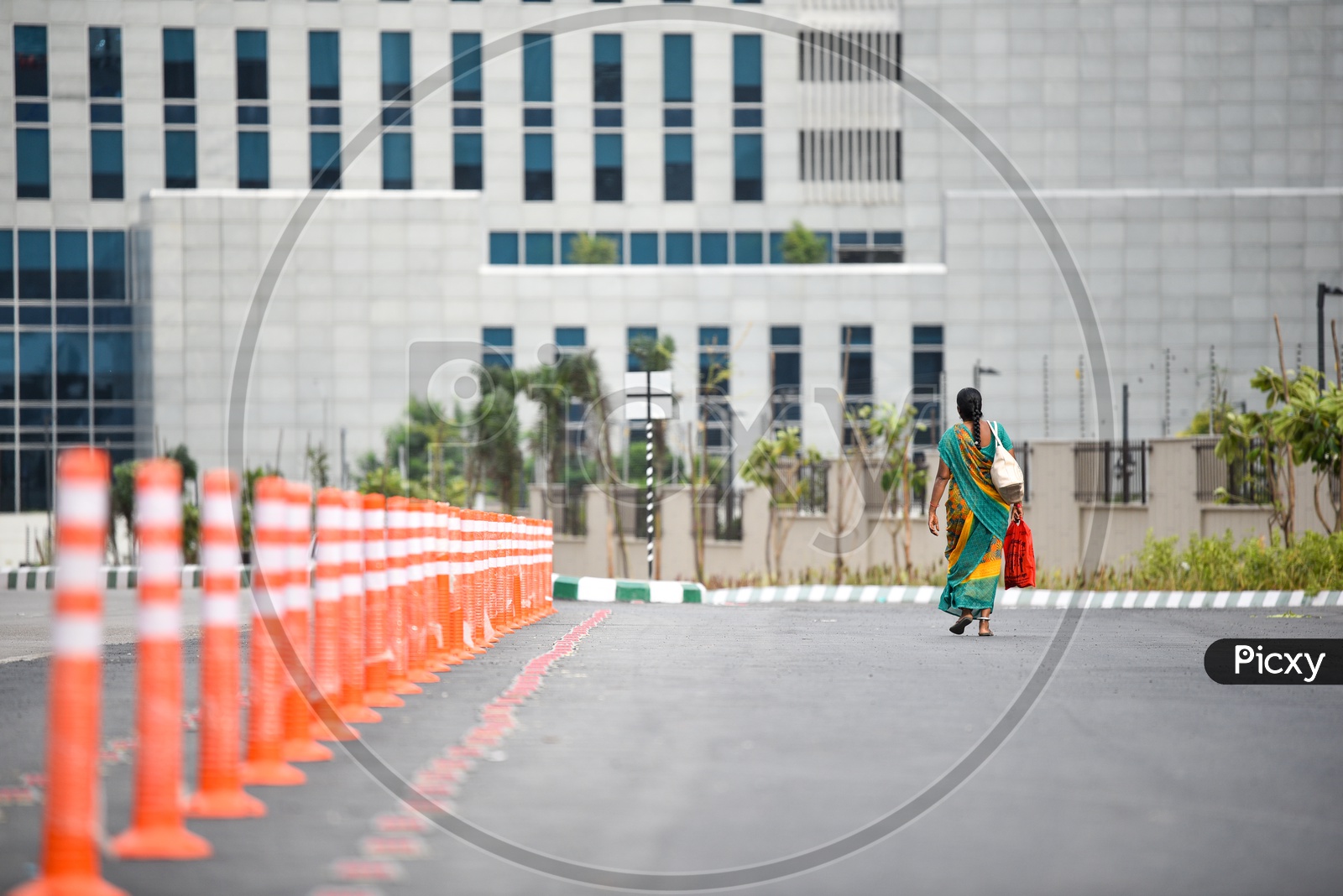 Indian Woman In Saree Walking Towards Corporate Office