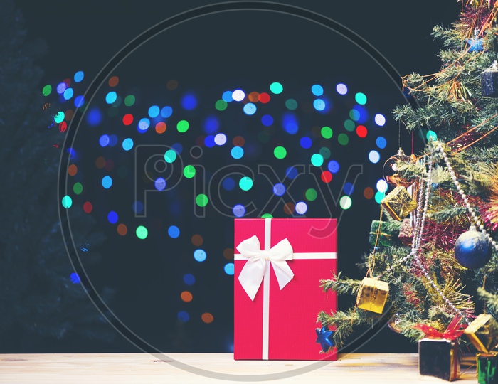 Christmas Gifts with Christmas tree and bokeh background