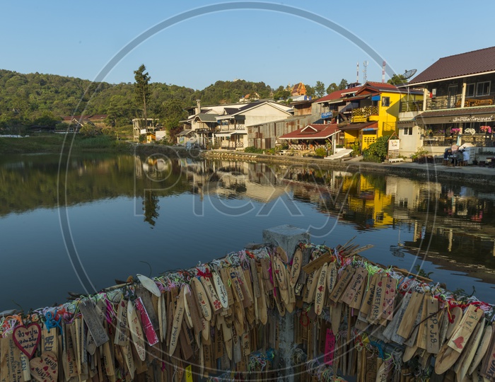 Old Tradition of Making Wish By Writing Or Signing On Wooden Strips At Pilok Village Lake