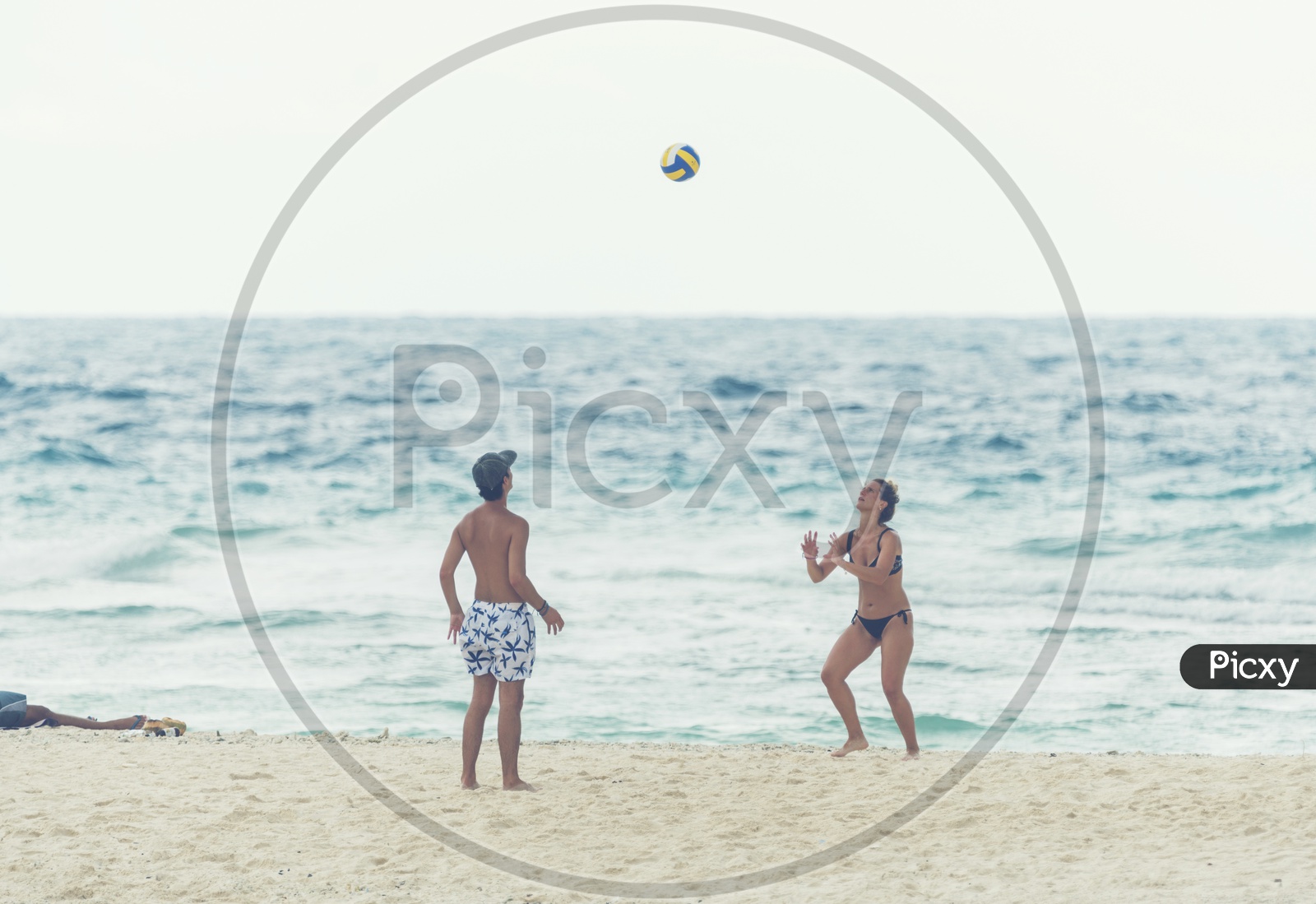Tourists Playing Beach Volleyball In Phuket Beach