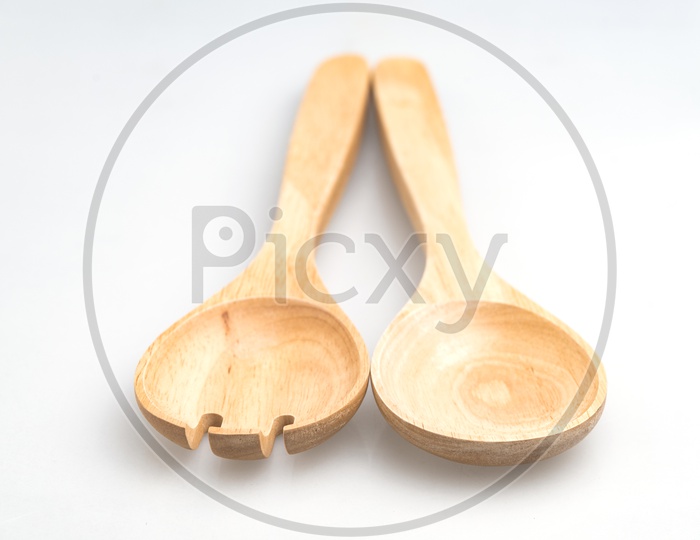 Kitchen accessories tools made of wood isolated on white background