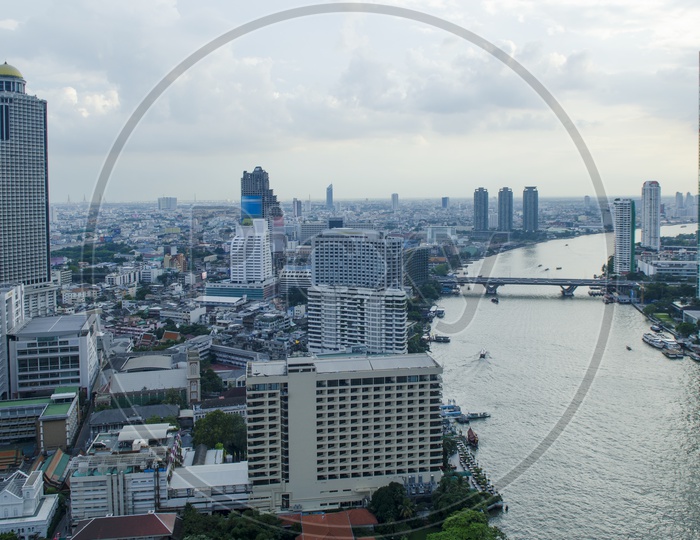 Top View Bangkok Cityscape With Chao Phraya River And High Rise building