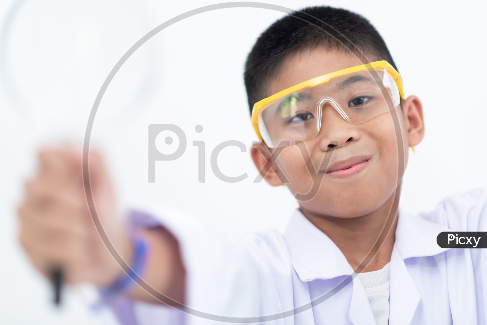 Boy Smiling When Learning In a Laboratory
