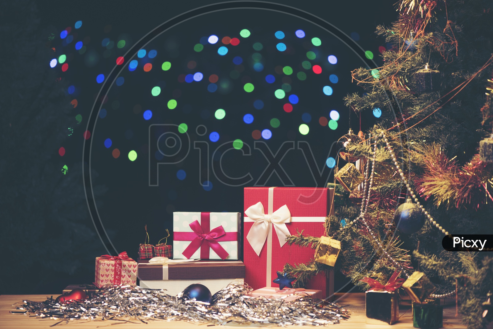 Christmas Gifts with Christmas tree and bokeh background