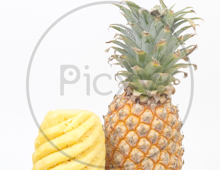 Fresh Peeled Pineapple  On An isolated White background