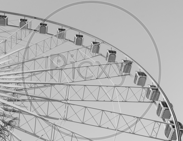 Closeup Shot of Beautiful large Ferris wheel in black and white Color
