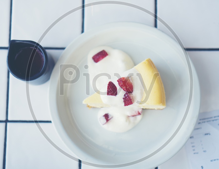 strawberry cheese cake on a Cafe Table