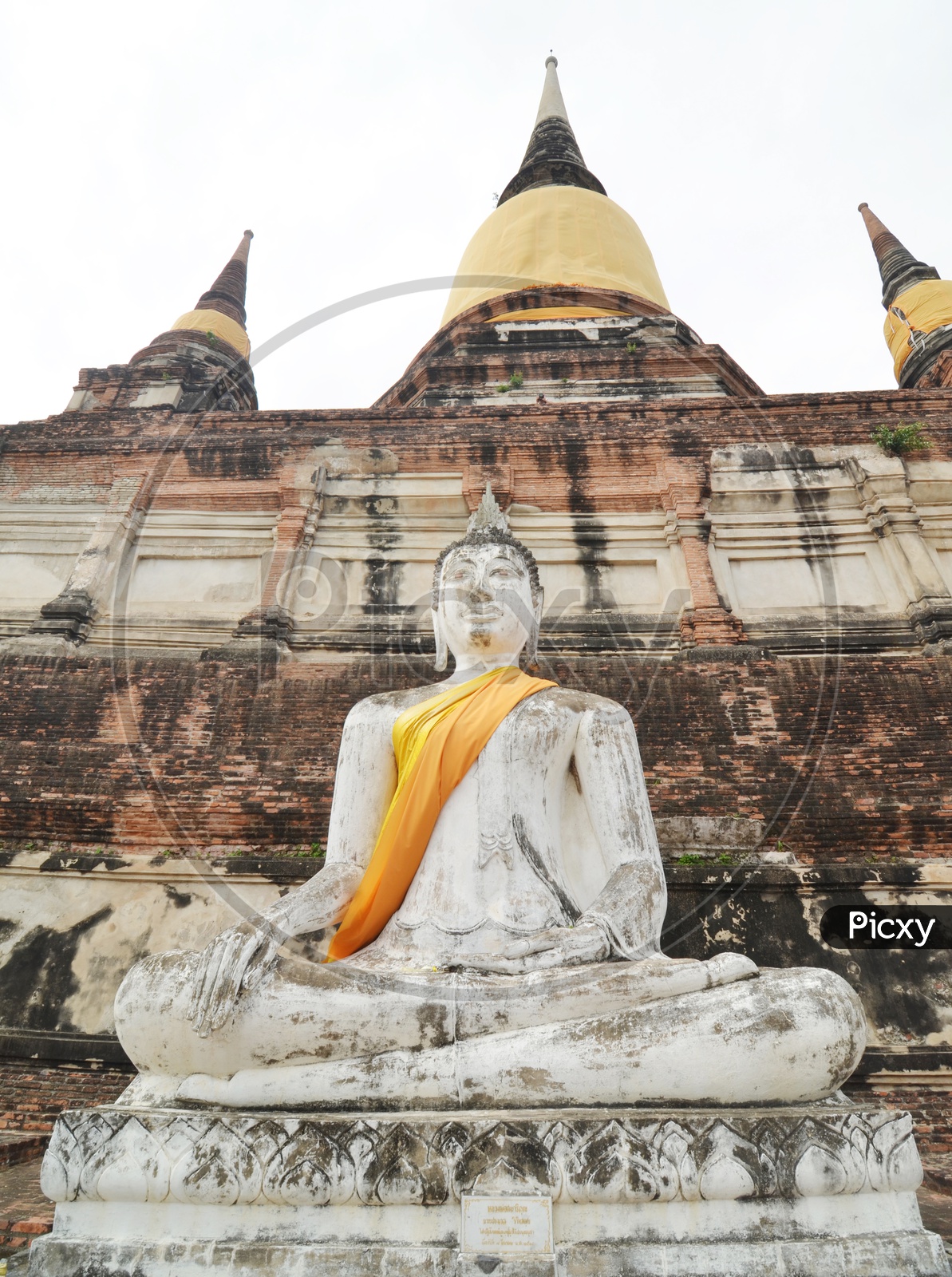 Buddhas and Pagoda or temple Shrine  in Wat Yai Chai Mongkol at Ayutthaya In Thailand