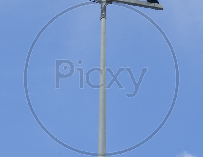 street lamp Pole  with blue sky Background